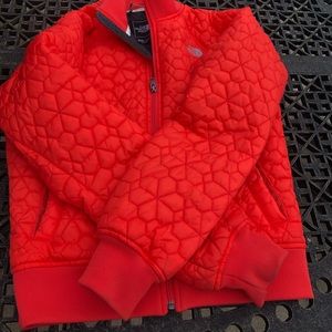 Orange north face jacket